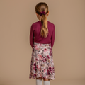 Soft satin scrunchie in burgundy, designed for a gentle hold, everyday comfort, and effortless style.