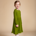 Girls' bamboo long-sleeve green dress with a ruffle hem, offering modest style, soft comfort, and all-day wear.
