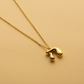 Gold Hebrew letter pendant necklace with a polished finish, offering a timeless, meaningful design for everyday wear and thoughtful gifting.