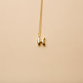 Gold letter H pendant necklace with a polished finish, offering a timeless, personalized design for everyday wear and thoughtful gifting.