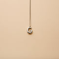 Silver letter G pendant necklace with a polished finish, offering a timeless, personalized design for everyday wear and thoughtful gifting.