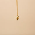 Gold letter F pendant necklace with a polished finish, offering a timeless, personalized design for everyday wear and thoughtful gifting.