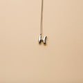 Silver letter H pendant necklace with a polished finish, offering a timeless, personalized design for everyday wear and thoughtful gifting.