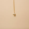 Gold letter T pendant necklace with a polished finish, offering a timeless, personalized design for everyday wear and thoughtful gifting.