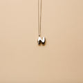 Silver letter N pendant necklace with a polished finish, offering a timeless, personalized design for everyday wear and thoughtful gifting.
