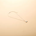 Silver letter K pendant necklace with a polished finish, offering a timeless, personalized design for everyday wear and thoughtful gifting.