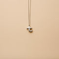 Silver letter T pendant necklace with a polished finish, offering a timeless, personalized design for everyday wear and thoughtful gifting.