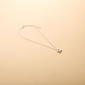 Silver letter R pendant necklace with a polished finish, offering a timeless, personalized design for everyday wear and thoughtful gifting.