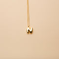 Gold letter N pendant necklace with a polished finish, offering a timeless, personalized design for everyday wear and thoughtful gifting.