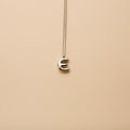 Silver letter E pendant necklace with a polished finish, offering a timeless, personalized design for everyday wear and thoughtful gifting.