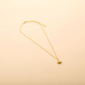 Gold letter J pendant necklace with a polished finish, offering a timeless, personalized design for everyday wear and thoughtful gifting.