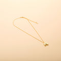 Gold letter M pendant necklace with a polished finish, offering a timeless, personalized design for everyday wear and thoughtful gifting.