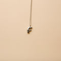 Silver letter F pendant necklace with a polished finish, offering a timeless, personalized design for everyday wear and thoughtful gifting.