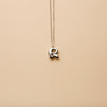 Silver letter R pendant necklace with a polished finish, offering a timeless, personalized design for everyday wear and thoughtful gifting.