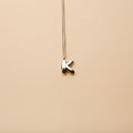Silver letter K pendant necklace with a polished finish, offering a timeless, personalized design for everyday wear and thoughtful gifting.