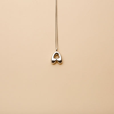 Silver letter A pendant necklace with a polished finish, offering a timeless, personalized design for everyday wear and thoughtful gifting.