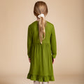 Girls' bamboo long-sleeve green dress with a ruffle hem, offering modest style, soft comfort, and all-day wear.
