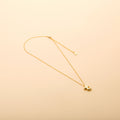 Gold letter T pendant necklace with a polished finish, offering a timeless, personalized design for everyday wear and thoughtful gifting.