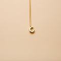 Gold letter C pendant necklace with a polished finish, offering a timeless, personalized design for everyday wear and thoughtful gifting.