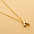 Gold Hebrew letter pendant necklace with a polished finish, offering a timeless, meaningful design for everyday wear and thoughtful gifting.