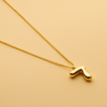 Gold Hebrew letter pendant necklace with a polished finish, offering a timeless, meaningful design for everyday wear and thoughtful gifting.