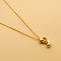 Gold Hebrew letter pendant necklace with a polished finish, offering a timeless, meaningful design for everyday wear and thoughtful gifting.