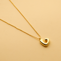 Gold Hebrew letter pendant necklace with a polished finish, offering a timeless, meaningful design for everyday wear and thoughtful gifting.