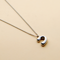 Silver Hebrew letter pendant necklace with a polished finish, offering a timeless, meaningful design for everyday wear and thoughtful gifting.