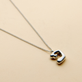 Silver Hebrew letter pendant necklace with a polished finish, offering a timeless, meaningful design for everyday wear and thoughtful gifting.